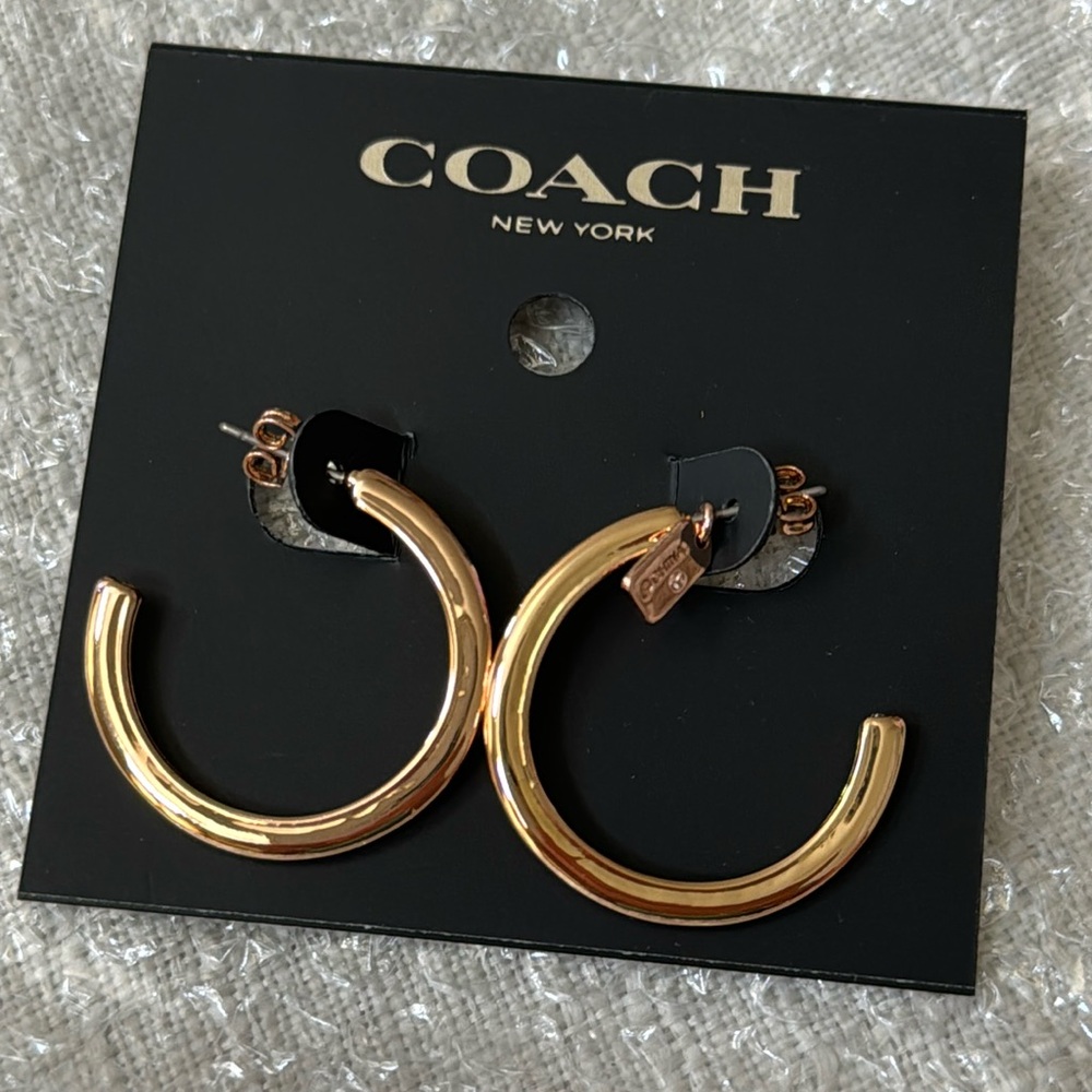 COACH yellow gold plated hoop earring. 1” hoopNew with tags.